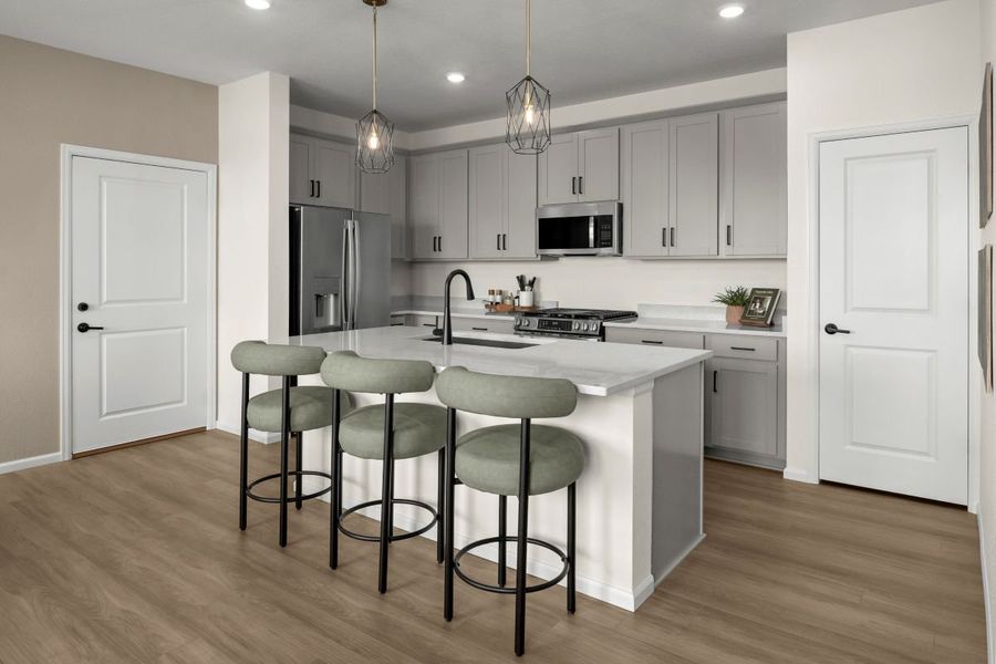 Furnished interior in a model home at The Nest Villas at Canyon Creek in Erie (Image 5).