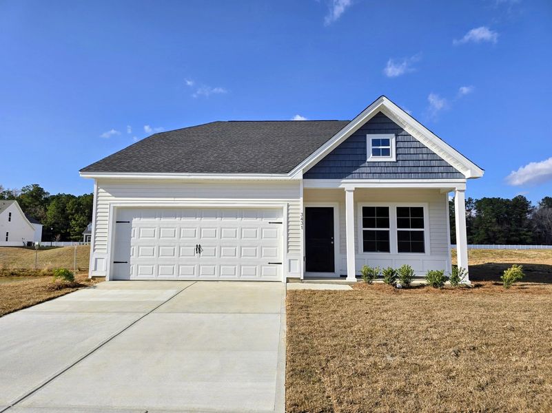 Front exterior of a new home in Hainer Place, Conway, SC, highlighting curb appeal (Image 1).