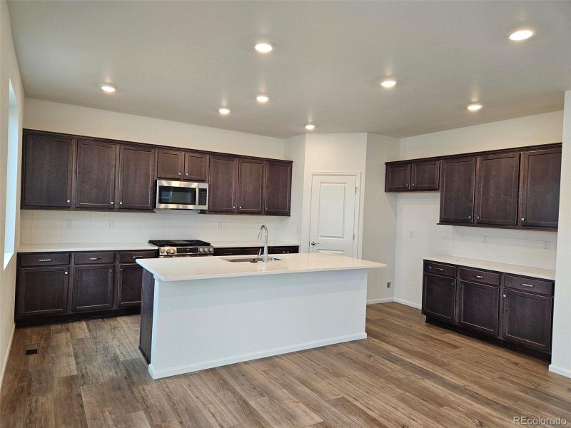 Furnished interior view inside a new home in The Cottages Collection at Ridgeline Vista, Brighton (Image 9). Furnished interior view inside a new home in The Cottages Collection at Ridgeline Vista, Brighton (Image 9).