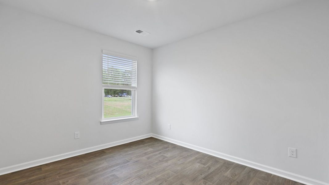 Representative unfurnished interior of a home built from the DOWNING by D.R. Horton in Saltgrass Landing, Winnabow (Image 23).