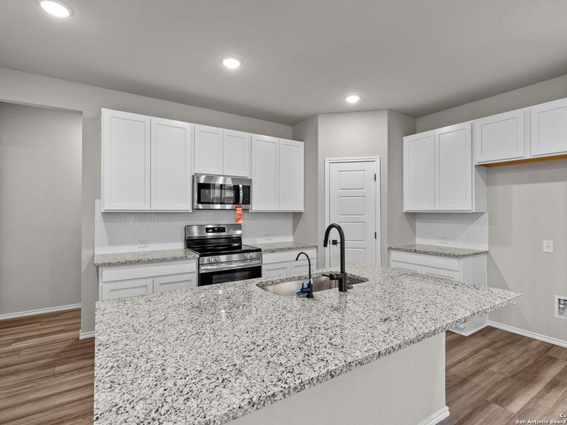 Furnished interior view inside a new home in Royal Crest, San Antonio (Image 6).