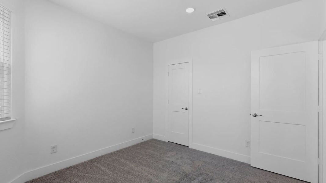 Representative unfurnished interior of a home built from the Oakdale by Chesmar Homes in Bridgeland Courtyard, Cypress (Image 26).
