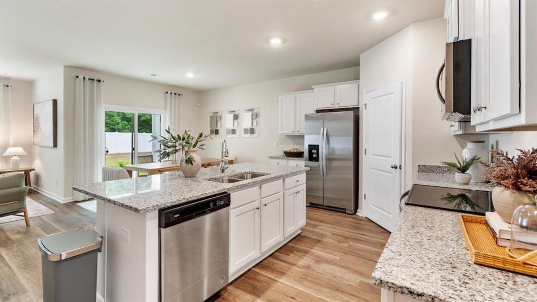 Furnished interior view inside a new home in The Landing at Hidden Lakes, McKinney (Image 8). Furnished interior view inside a new home in The Landing at Hidden Lakes, McKinney (Image 8).