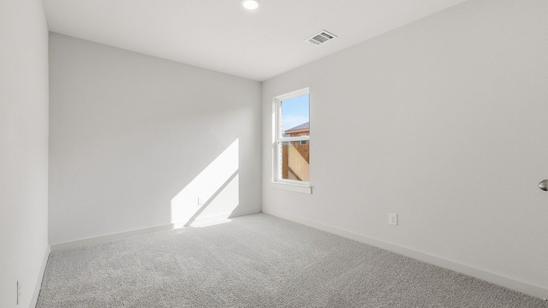 Furnished interior view inside a new home in Patriot Estates, Venus (Image 12).