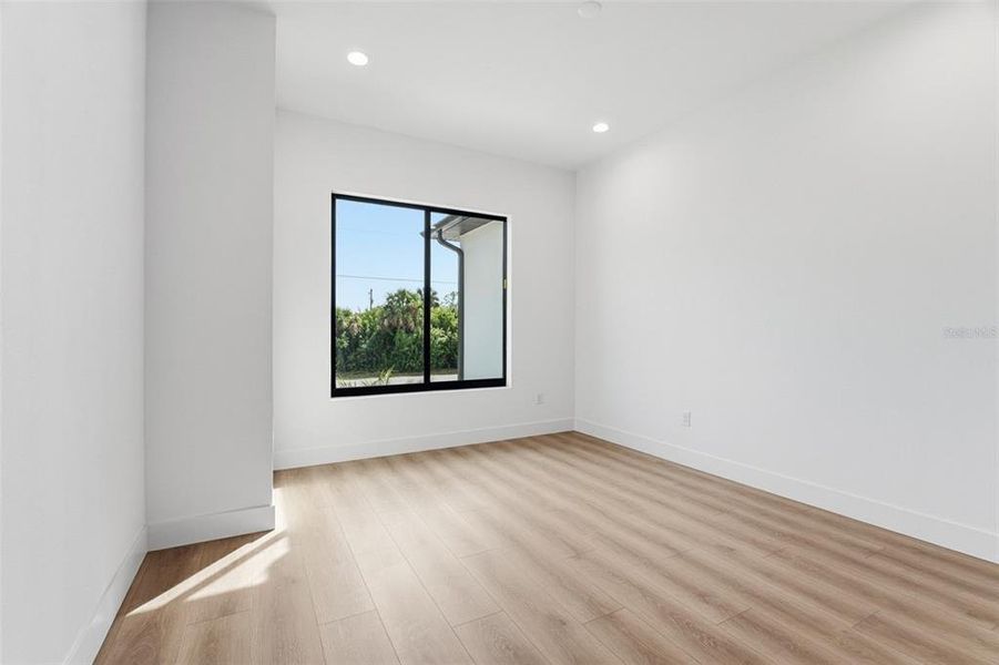 Spacious, unfurnished interior of a new home in , Port Charlotte (Image 32).