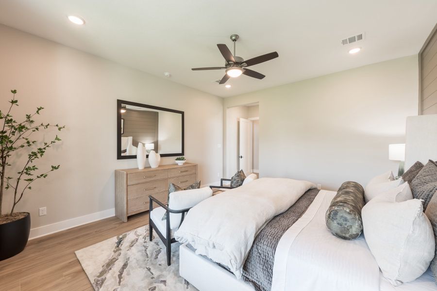 Representative furnished interior of a home built from the Camden by Tri Pointe Homes in Bridgeland, Cypress (Image 33).