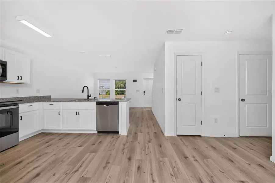 Furnished interior view inside a new home in , Port Charlotte (Image 14).