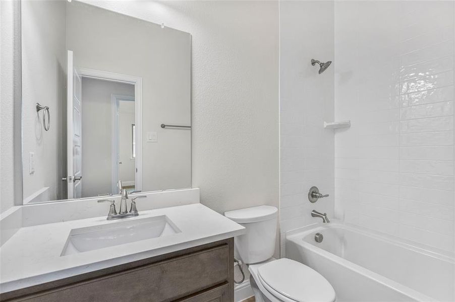 Furnished interior view inside a new home in Creekview Meadows, Pilot Point (Image 10).