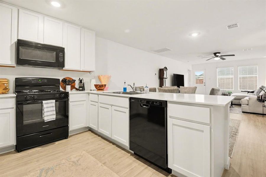 Furnished interior view inside a new home in Mobberly Farms, Pilot Point (Image 9).