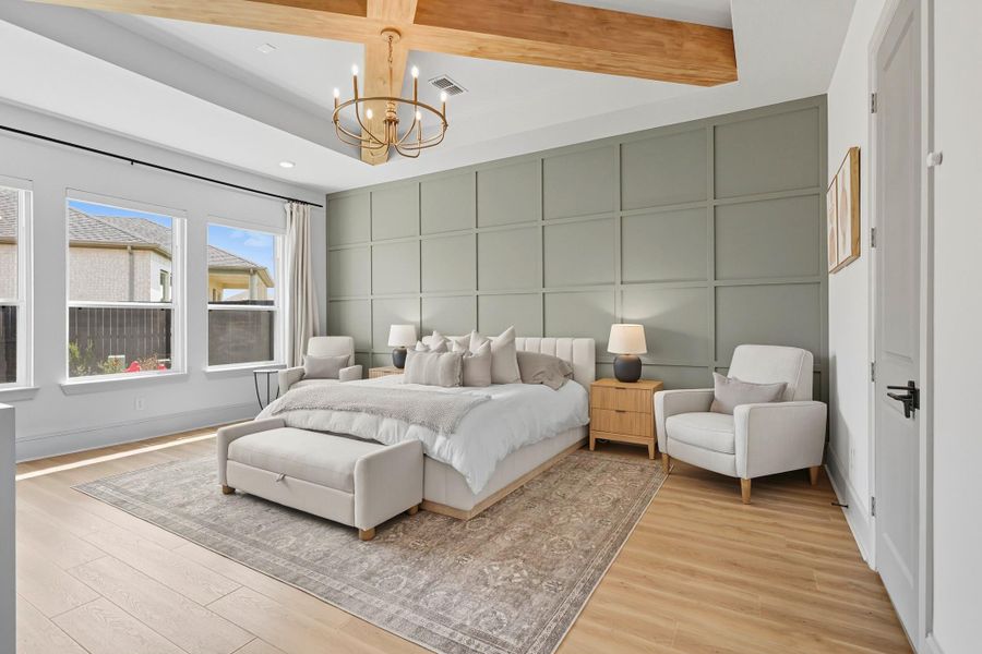 Primary bedroom, view from entry. Beautiful accent wall included. Primary bedroom, view from entry. Beautiful accent wall included.