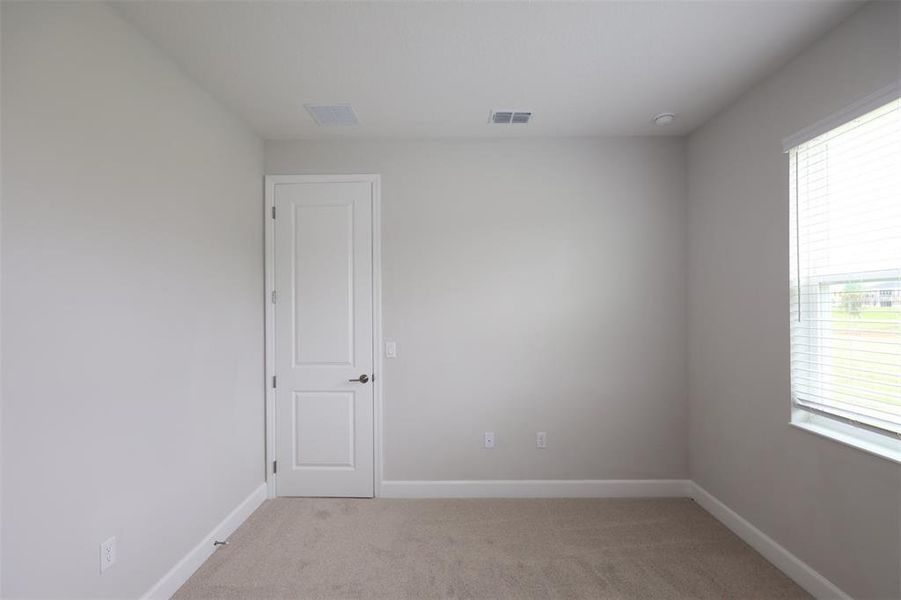 Spacious, unfurnished interior of a new home in Solace at Corner Lake, Orlando (Image 19).
