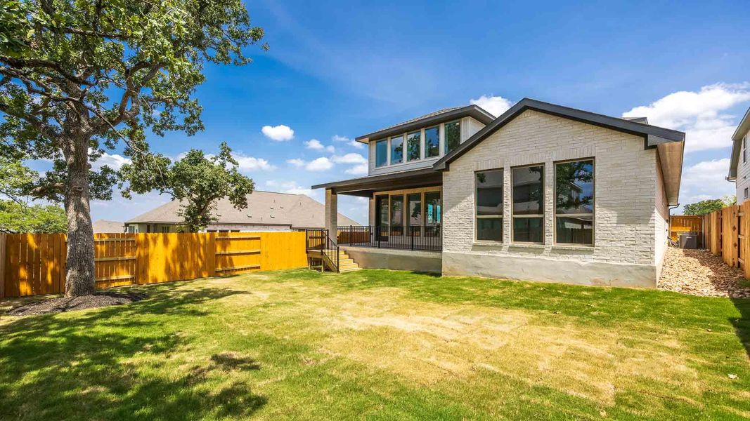 Exterior details and patio area of a home in Parkside on the River West, Georgetown (Image 2).