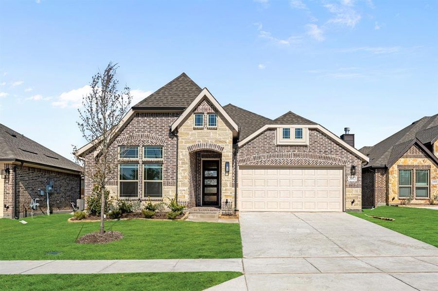 Front exterior of a new home in Meadow Vista 60-65, Anna, TX, highlighting curb appeal (Image 1). Front exterior of a new home in Meadow Vista 60-65, Anna, TX, highlighting curb appeal (Image 1).