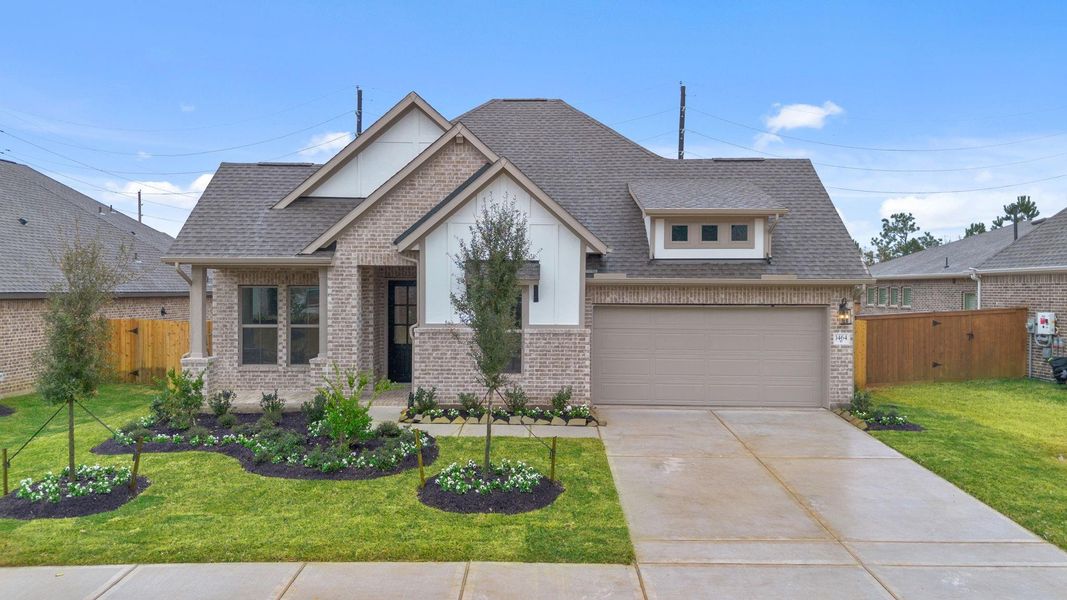 Front exterior of a new home in Escondido, Magnolia, TX, highlighting curb appeal (Image 19).