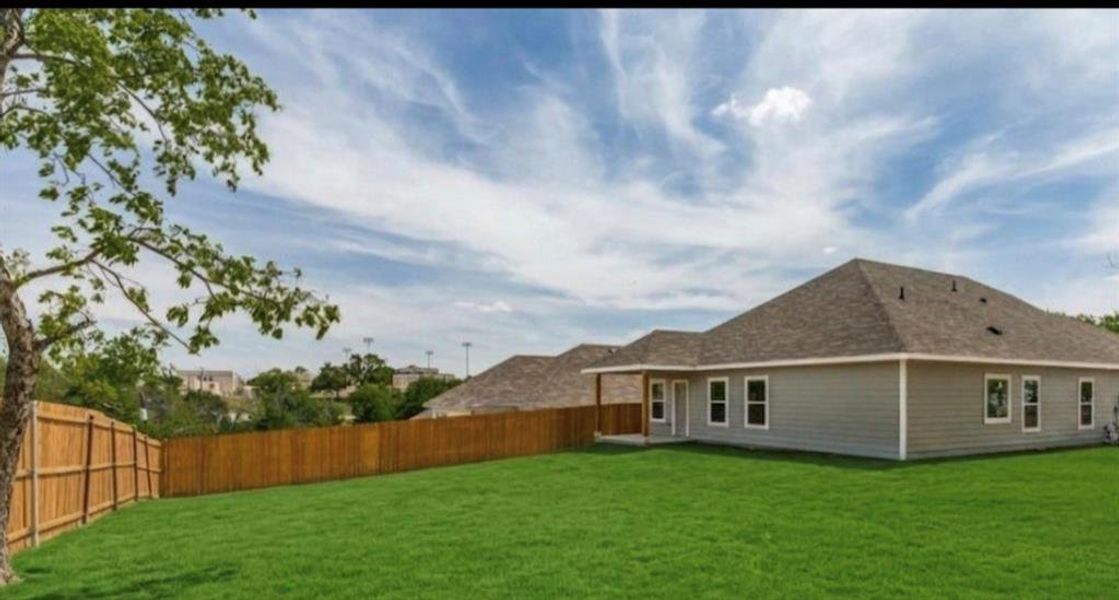 Exterior details and patio area of a home in , Fort Worth (Image 15).