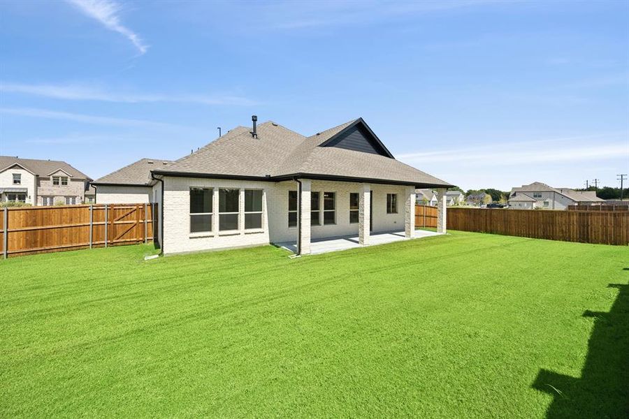 Exterior details and patio area of a home in Lincoln Pointe, Van Alstyne (Image 3). Exterior details and patio area of a home in Lincoln Pointe, Van Alstyne (Image 3).