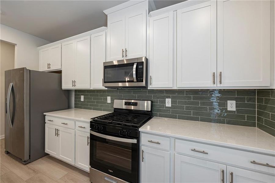 Furnished interior view inside a new home in Creekside at Oxford Park, Fairburn (Image 12).