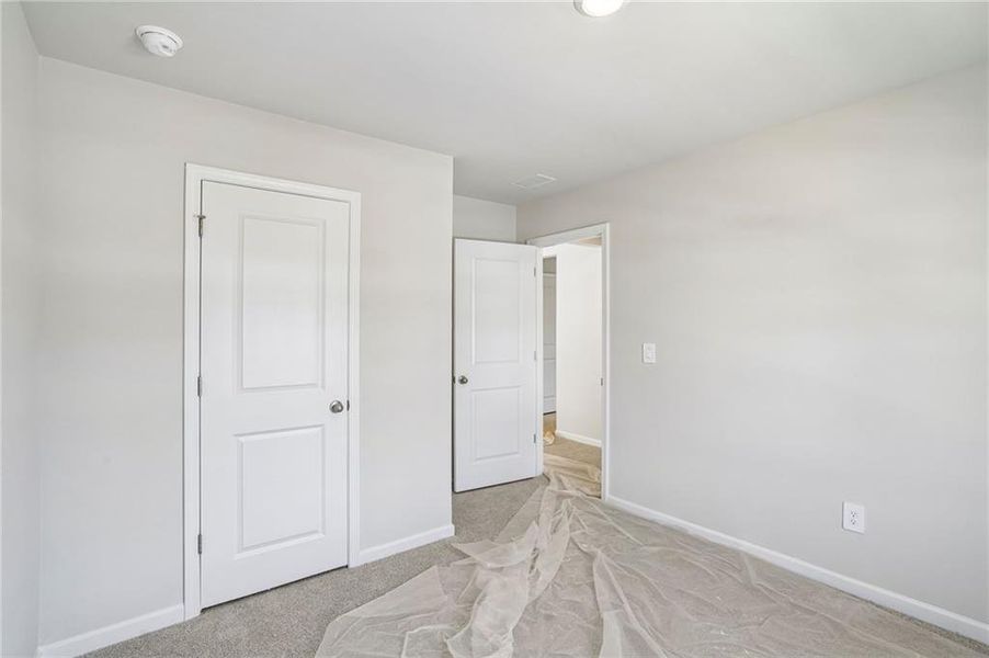 Spacious, unfurnished interior of a new home in Hawthorne Station, College Park (Image 31).