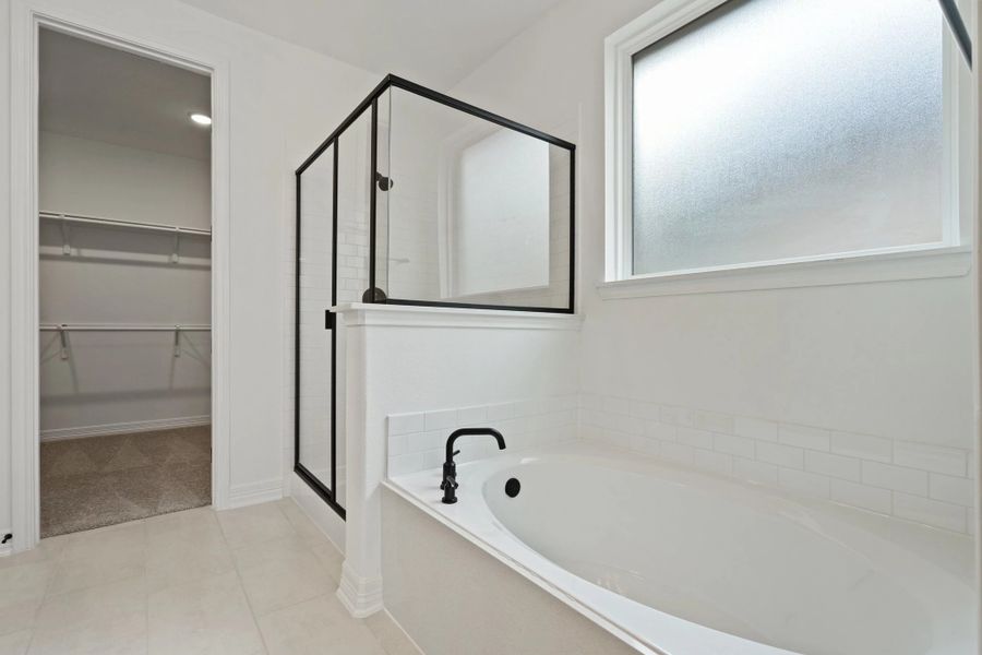 Primary bath. Note: Sample product photo. Actual exterior and interior selections may vary by homesite. Photo may be virtually staged