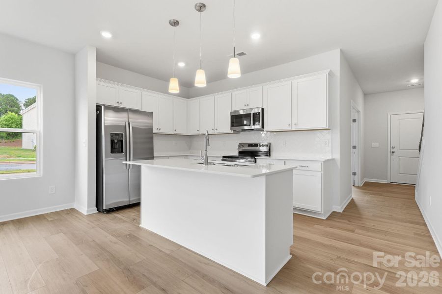 Furnished interior view inside a new home in Piper Creek, Newton (Image 14).