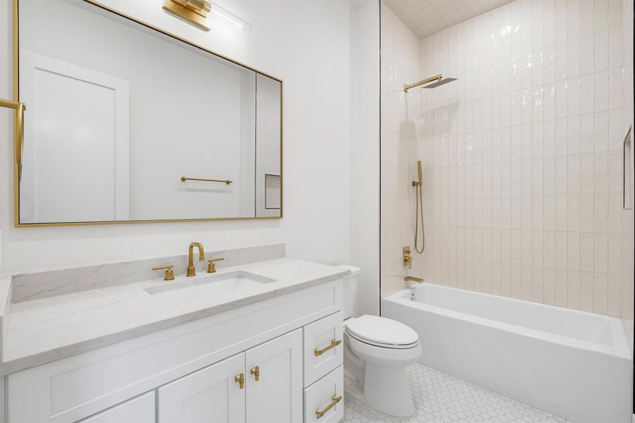 Accent tile on each secondary bathroom ceiling.