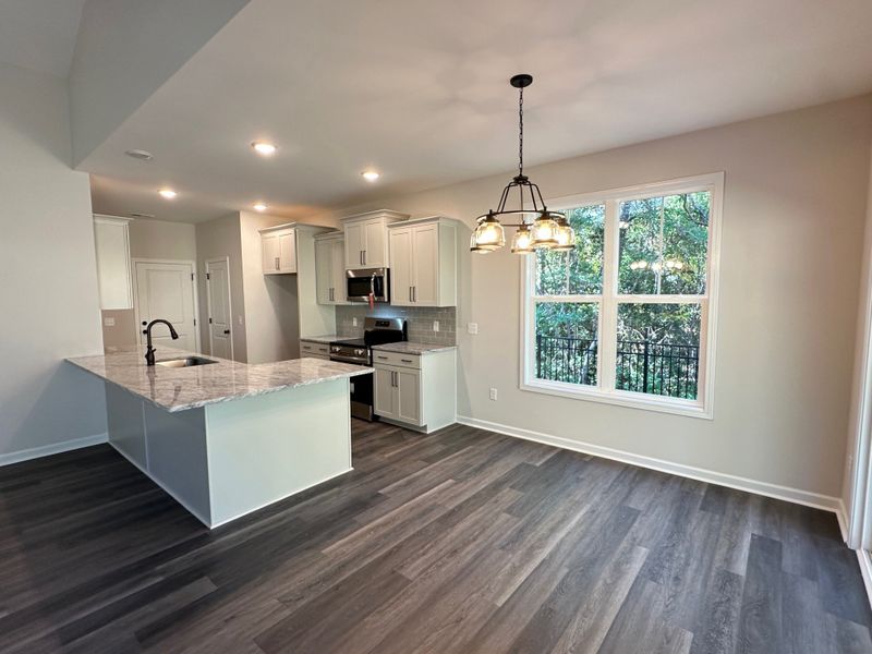 Furnished interior view inside a new home in River Hills, Shallotte (Image 9).