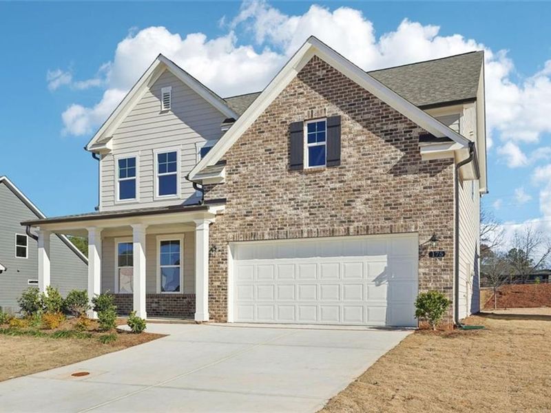 Front exterior of a new home in Wehunt Meadows, Hoschton, GA, highlighting curb appeal (Image 2).