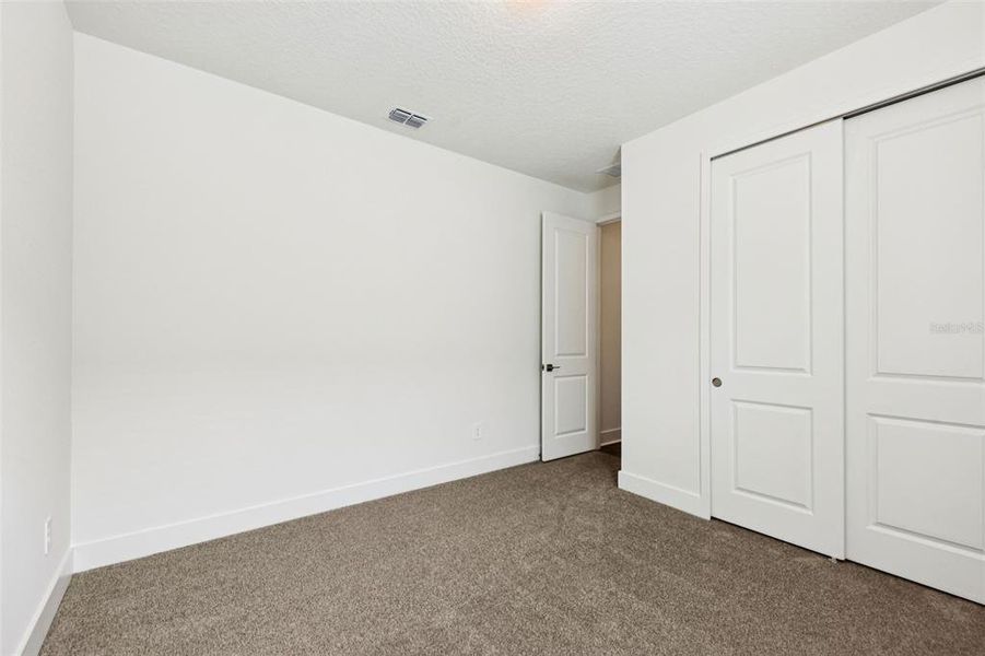 Spacious, unfurnished interior of a new home in Ridgehaven - Signature Series, Ormond Beach (Image 39).