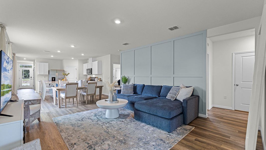 Representative furnished interior of a home built from the HARPER by D.R. Horton in Wynwood, Ocoee (Image 7).
