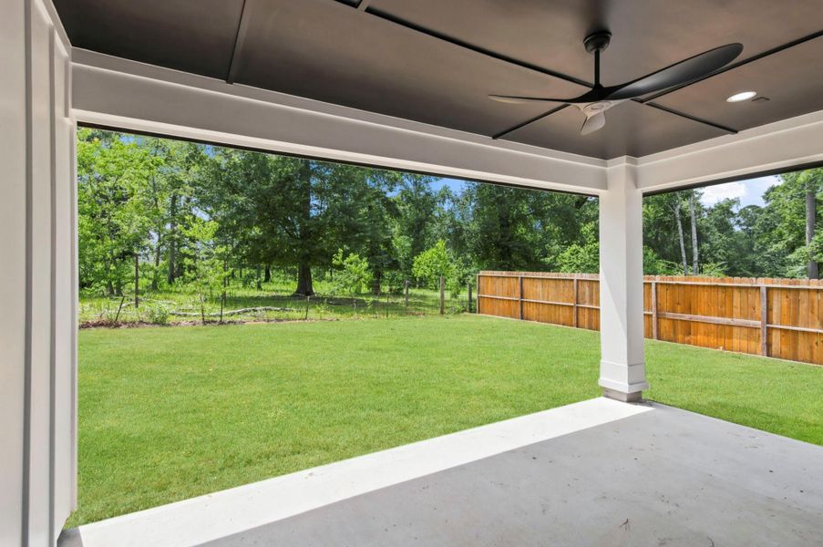 This stunning covered patio features a bold, dark-paneled accent ceiling and a sleek modern fan for the ultimate backyard vibe. Fully fenced and backed by mature trees, it’s ready for your next weekend BBQ. This stunning covered patio features a bold, dark-paneled accent ceiling and a sleek modern fan for the ultimate backyard vibe. Fully fenced and backed by mature trees, it’s ready for your next weekend BBQ.