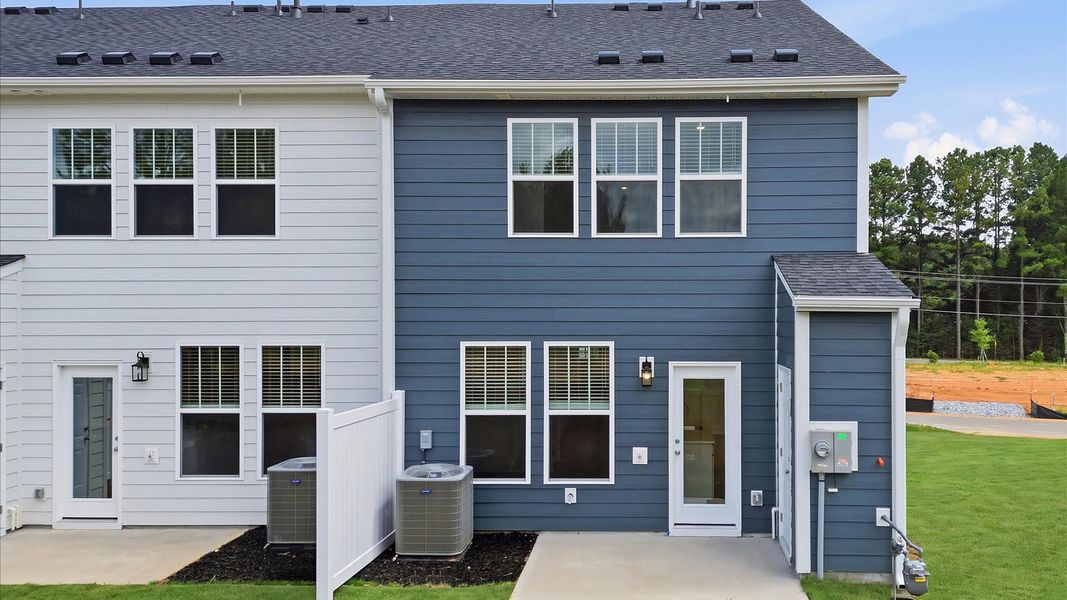 Notable exterior includes a private backyard designed for year-round enjoyment by DRB Homes