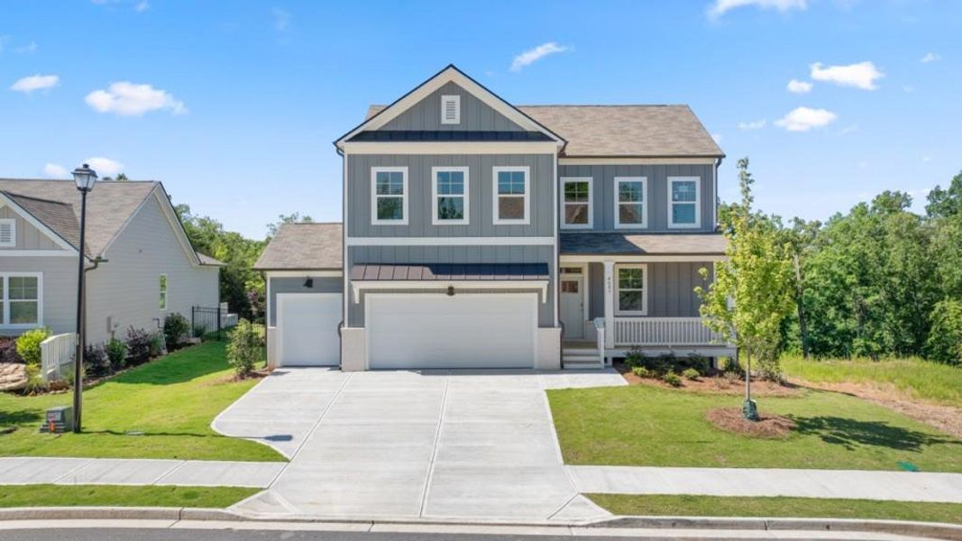 Front exterior of a new home in Falcon Landing, Gainesville, GA, highlighting curb appeal (Image 2). Front exterior of a new home in Falcon Landing, Gainesville, GA, highlighting curb appeal (Image 2).