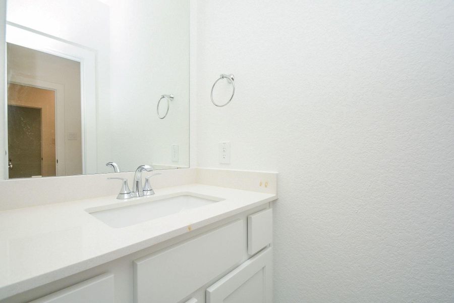Well designed bathroom offering comfort and convenience for family and guests. Well designed bathroom offering comfort and convenience for family and guests.