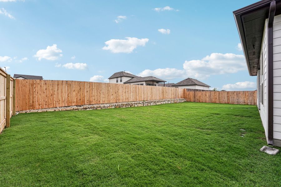 Exterior details and patio area of a home in Sage Hollow, Kyle (Image 16).