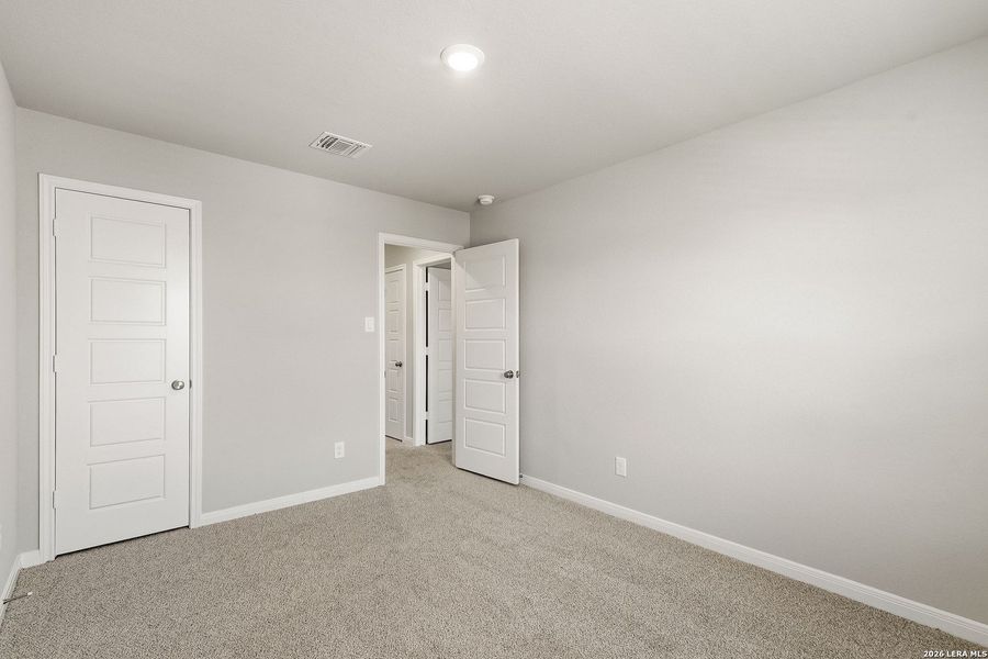 Spacious, unfurnished interior of a new home in Hickory Ridge, Elmendorf (Image 24).