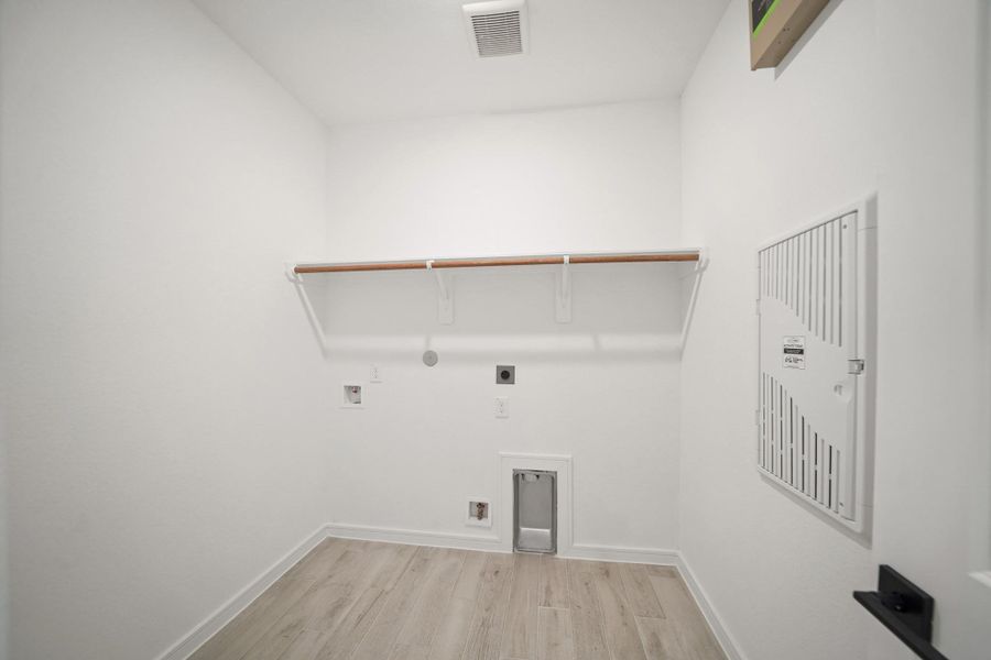 Laundry room (*Photo not of actual home and used for illustration purposes only.)