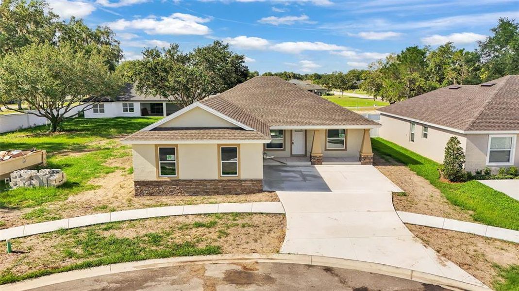 Front exterior of a new home in , Bartow, FL, highlighting curb appeal (Image 30).