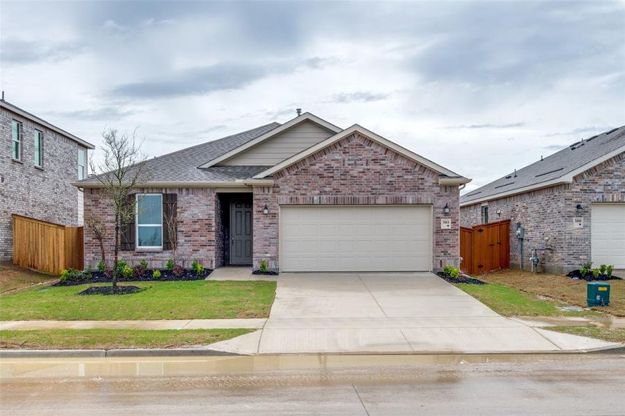 Front exterior of a new home in Heartland, Heartland, TX, highlighting curb appeal (Image 1). Front exterior of a new home in Heartland, Heartland, TX, highlighting curb appeal (Image 1).