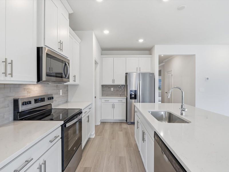 Furnished interior view inside a new home in Palmetto Place, Longs (Image 6).
