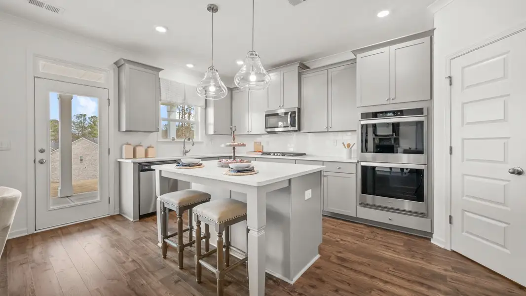 Representative furnished interior of a home built from the Savannah by D.R. Horton in Water Oak Estates, Lawrenceville (Image 4).