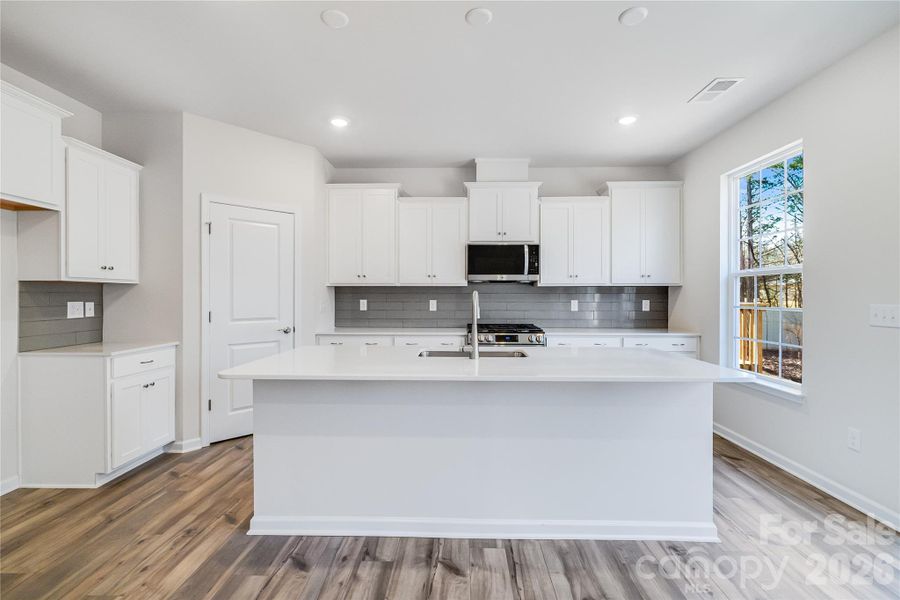Furnished interior view inside a new home in Village of Waxhaw, Waxhaw (Image 10).