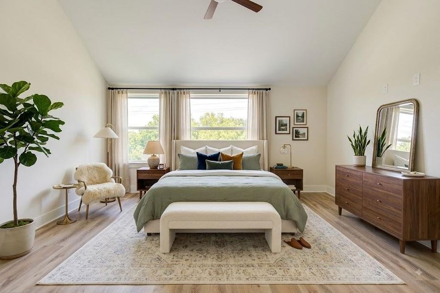 Larger appointed primary suite with vaulted ceilings, abundant natural lighting, and views to downtown. Perfect retreat from the urban city life. Larger appointed primary suite with vaulted ceilings, abundant natural lighting, and views to downtown. Perfect retreat from the urban city life.