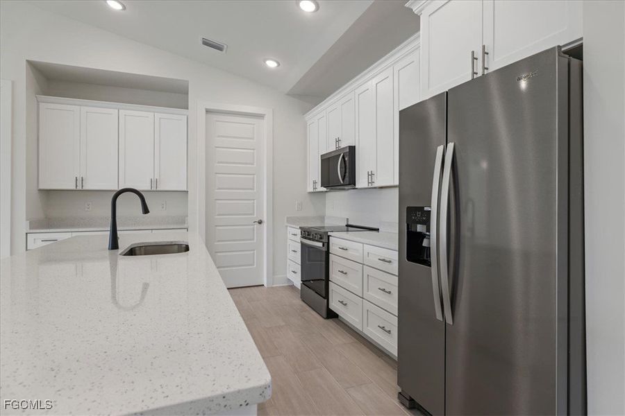 Furnished interior view inside a new home in Cape Coral, Cape Coral (Image 8).