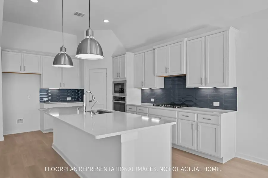 Furnished interior view inside a new home in The Oaks on 6th Street, Magnolia (Image 7).