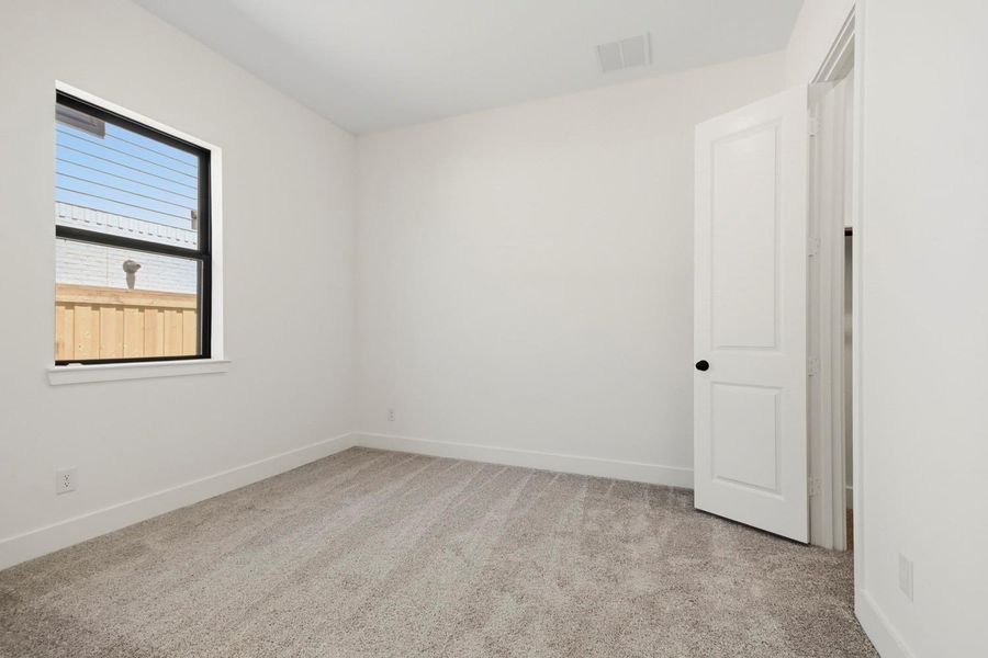 Spacious, unfurnished interior of a new home in Dunham Pointe 70', Cypress (Image 16).