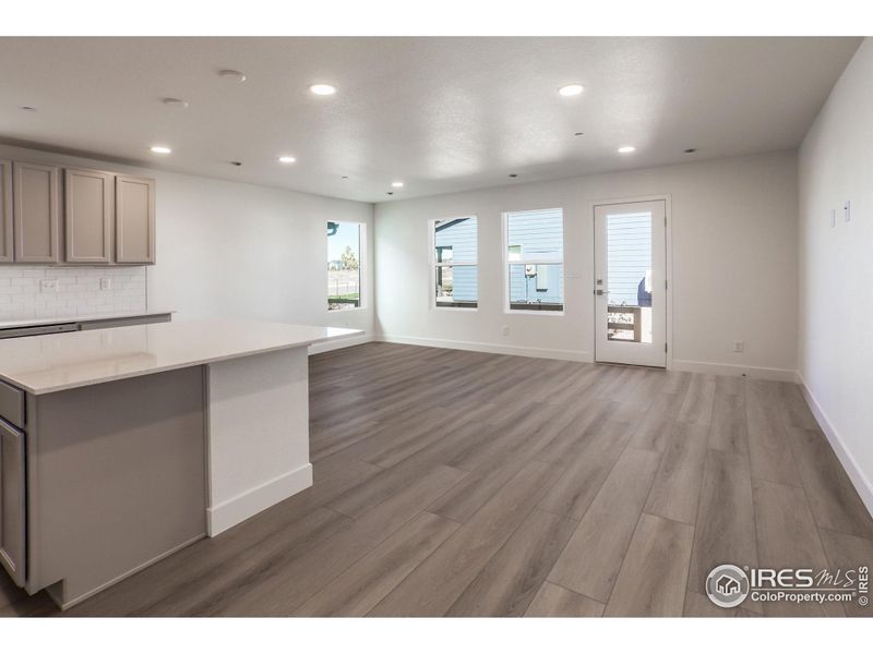 KITCHEN, DINING AND LIVING ROOM