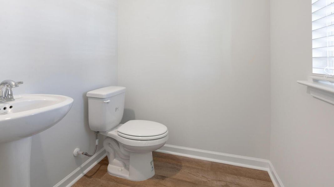 Representative furnished interior of a home built from the ARDEN by D.R. Horton in Eagle Creek, Bolivia (Image 10).