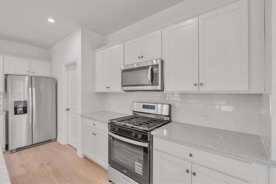 Furnished interior view inside a new home in The View at Groover's Lake, Lithia Springs (Image 10).
