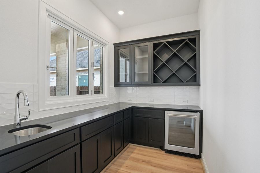 Furnished interior view inside a new home in Del Bello Lakes 60', Manvel (Image 9).