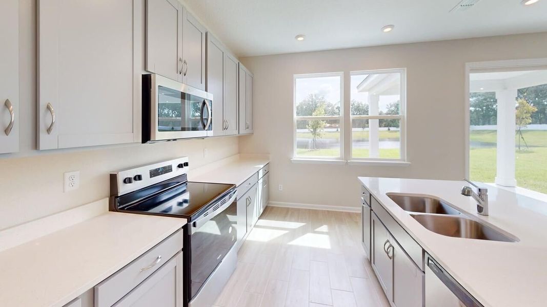Furnished interior view inside a new home in Sandridge Hills, Green Cove Springs (Image 4).